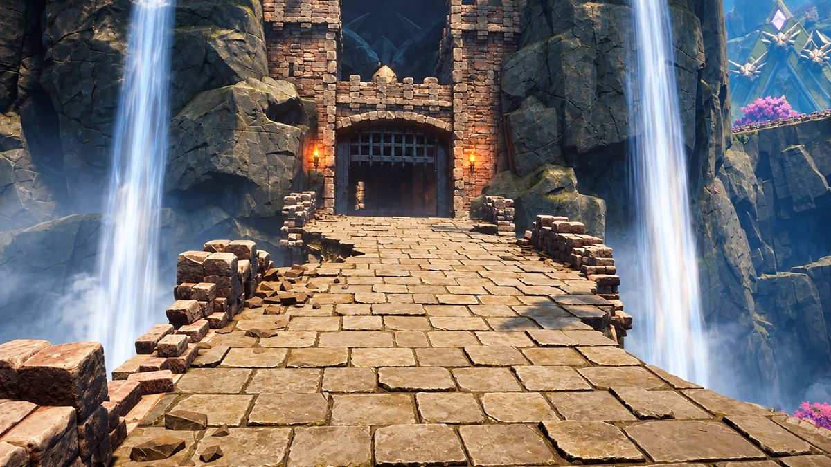 A stone bridge between two waterfalls, leading to a gated fortress entrance